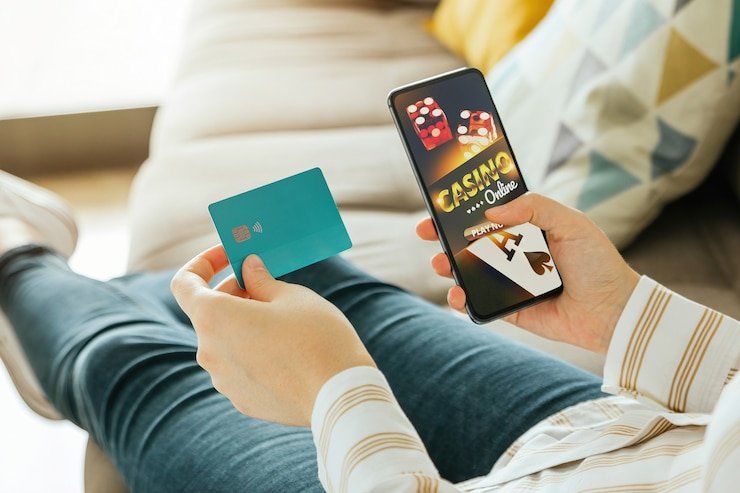 Antarmuka aplikasi dippy menampilkan meja live dealer dan pasar sportsbook